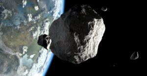 Asteroide en el espacio frente a la Tierra. Foto: Twitter