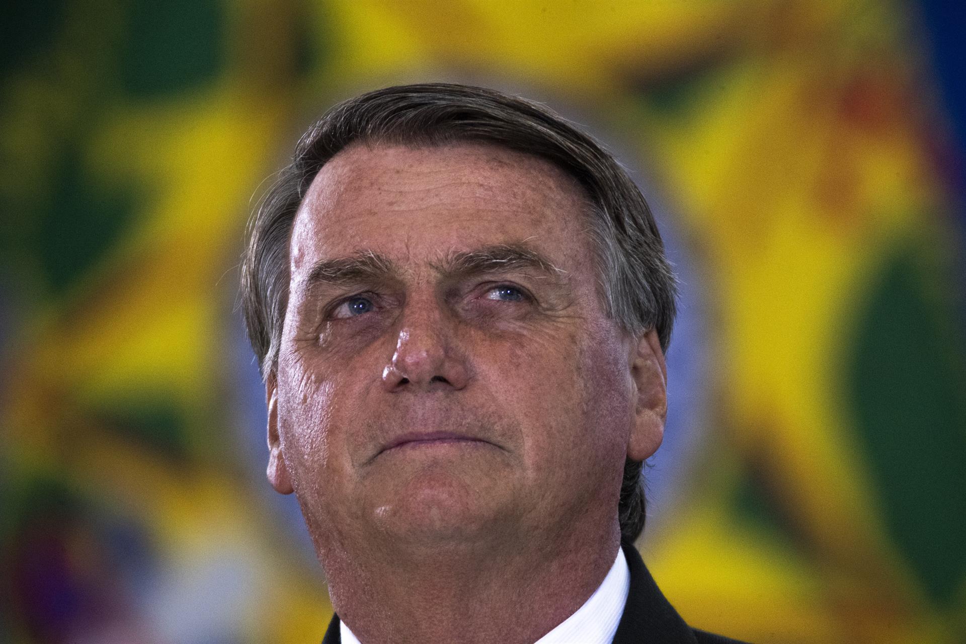 BRA126. BRASÍLIA (BRASIL), 05/04/2022. - El presidente de Brasil, Jair Bolsonaro, participa este martes en el Palacio do Planalto de una Ceremonia de Felicitación a los Oficiales Generales ascendidos, en Brasilia (Brasil) EFE/ Joédson Alves.