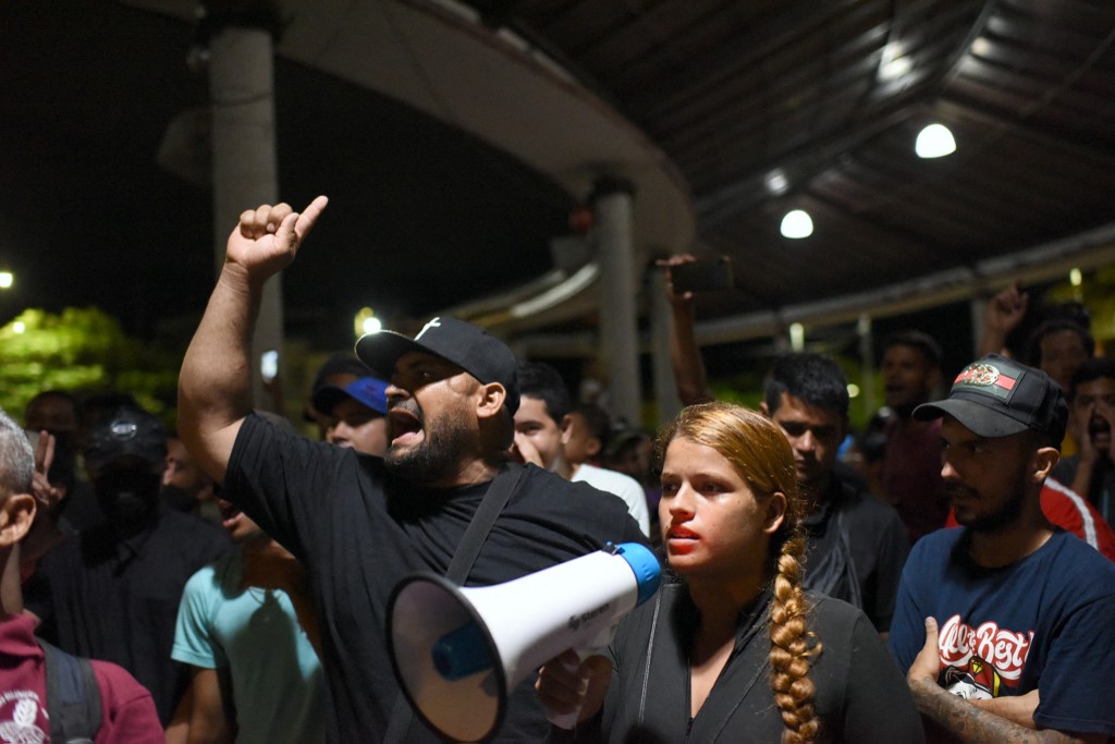 Migrantes venezolanos y de otras nacionalidades protestan en la ciudad mexicana de Tapachula. Foto: ISAAC GUZMAN / AFP